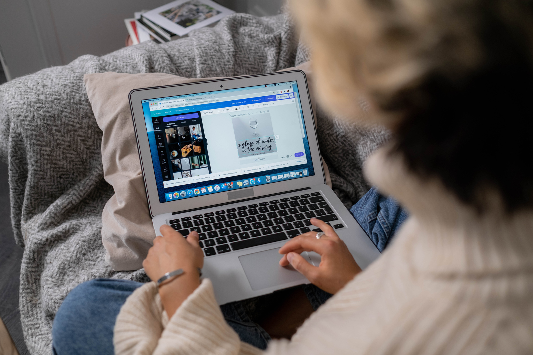 Woman Wearing Sweater Using Laptop